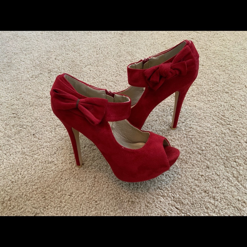 Red peep-toe pumps
